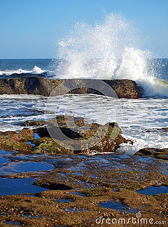 Waves smashing agaist rocks Stock Photo