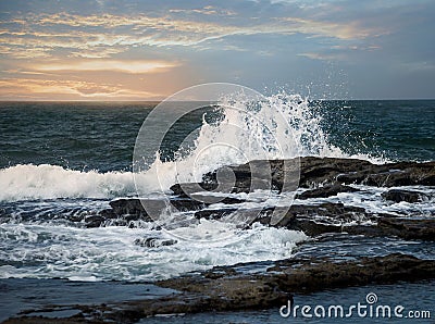 Waves splashing against the rocks Stock Photo