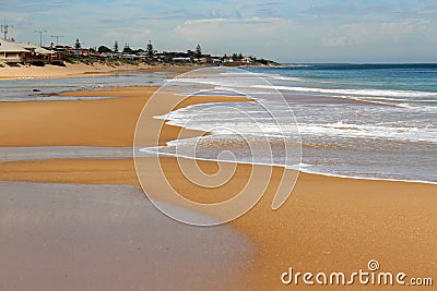 Waves splashing on basalt rocks at Ocean beach Bunbury Western Australia Stock Photo