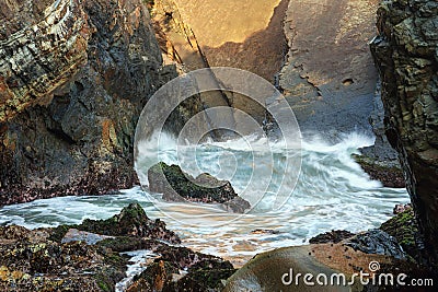 Waves at Sugarloaf Point Sea Chasm Cave Stock Photo