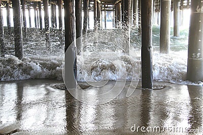 Waves under Santa Monica pier California Stock Photo