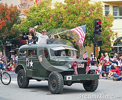 Waving the American Flag, Veteran`s Day Parade Editorial Stock Photo