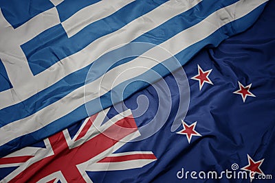 waving colorful flag of new zealand and national flag of greece Stock Photo