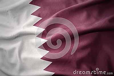 Waving colorful flag of qatar. Stock Photo