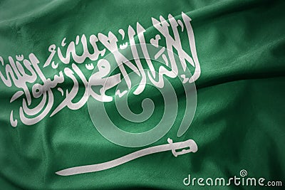 Waving colorful flag of saudi arabia. Stock Photo