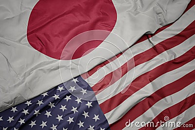 waving colorful flag of united states of america and national flag of japan Stock Photo