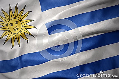 Waving colorful flag of uruguay. Stock Photo