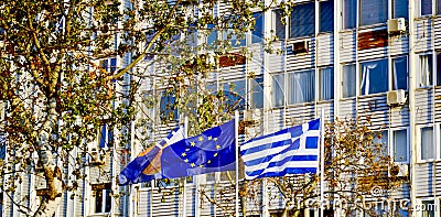 Waving colorful Greece and EU flags Editorial Stock Photo