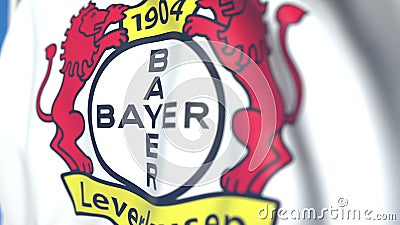 Waving flag with Bayer Leverkusen football club logo, close-up. Editorial 3D rendering Editorial Stock Photo