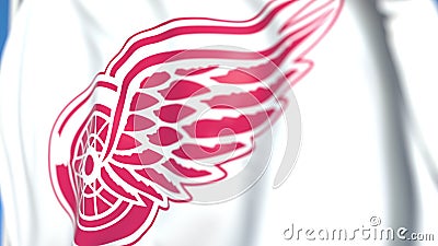 Waving flag with Detroit Red Wings NHL hockey team logo, close-up. Editorial 3D rendering Editorial Stock Photo