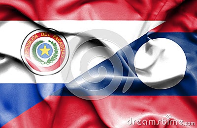 Waving flag of Laos and Paraguay Stock Photo