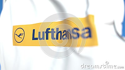 Flying flag with Lufthansa logo, close-up. Editorial 3D rendering Editorial Stock Photo