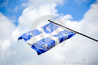 The waving flag of Quebec Stock Photo