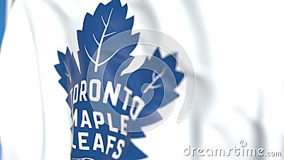 Waving flag with Toronto Maple Leafs NHL hockey team logo, close-up. Editorial 3D rendering Editorial Stock Photo