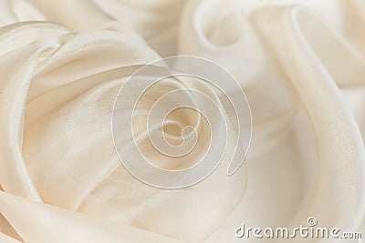 Wavy beige organza close-up Stock Photo