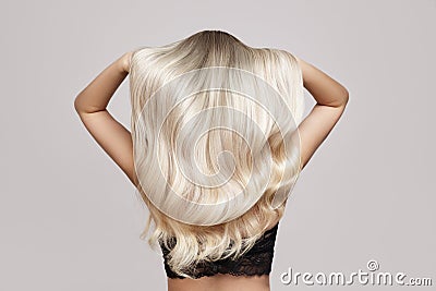 Wavy blond hair back view Stock Photo
