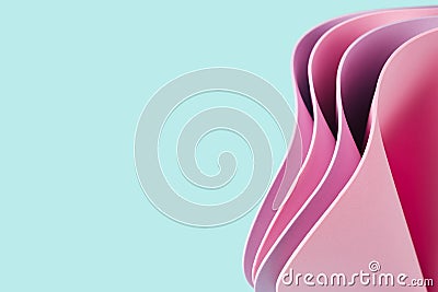 Wavy 3D pink sheets on a bright mint background. Stock Photo