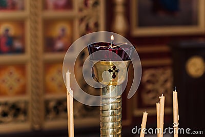 Wax candles in the interior of the church. Orthodox christian candles Stock Photo