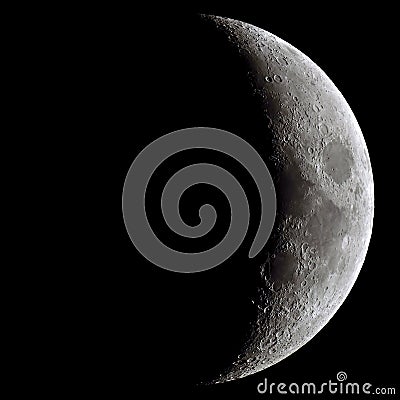 Waxing crescent Moon through a telescope Stock Photo