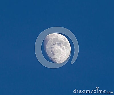 Waxing Gibbous Moon in Blue Sky Stock Photo