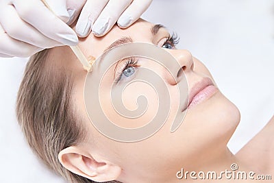 Waxing woman body. Sugar hair removal. laser service epilation. Salon wax beautician procedure Stock Photo