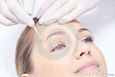 Waxing woman body. Sugar hair removal. laser service epilation. Salon wax beautician procedure Stock Photo