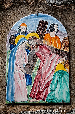 Way of the cross. 4th Station. Jesus meets his mother. Hand painted ceramic tile, Ingurtosu, Arbus, South Sardinia Editorial Stock Photo