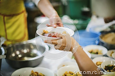 The way of life for the needy to get free food from the compassionate: the concept of food sharing Stock Photo