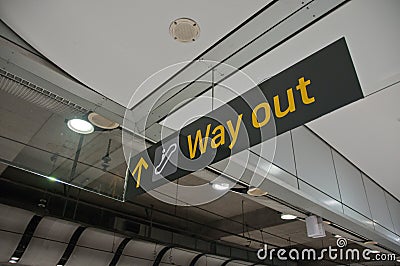 Way out emergency evacuation exit sign arrow direction Stock Photo