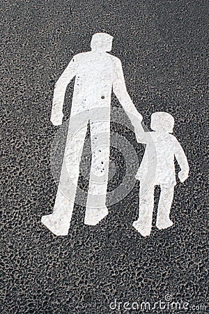 Way for pedestrians - father with child - sign on asphalt Stock Photo