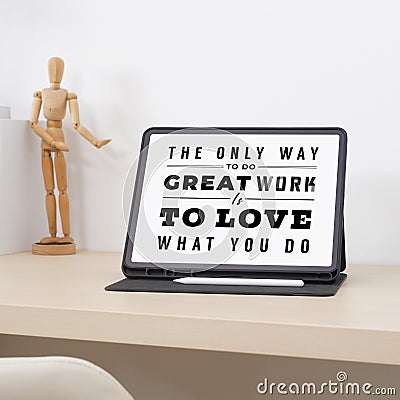 The only way to do great work is to love what you do. Quote on tablet. Stock Photo