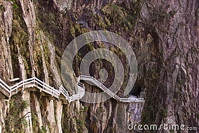 Stone Steep Steps . Trekking walking hiking Huangshan Mountain. Stock Photo