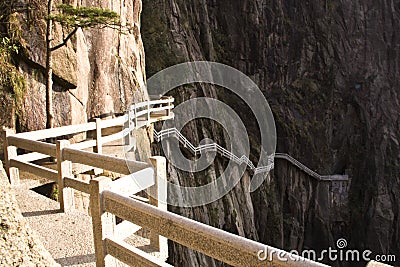 Stone Steep Steps . Trekking walking hiking Huangshan Mountain. Stock Photo