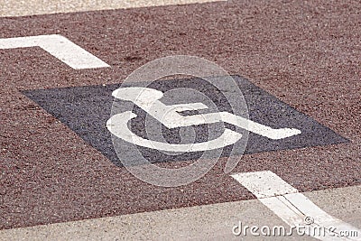 Way of wheel chair in the garden, disabled icon sign on the road in the public park. Stock Photo