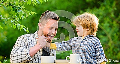 Ways to develop healthy eating habits. Feed your baby. Natural nutrition concept. Feeding son natural foods. Stage of Stock Photo
