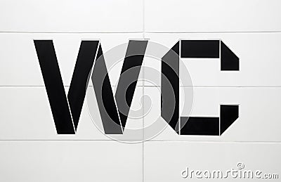 WC toilet black white tile Stock Photo