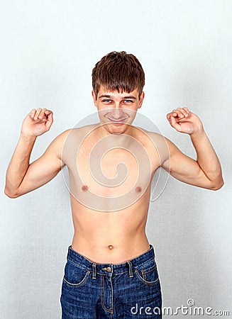 Weak Man Muscle Flexing Stock Photo