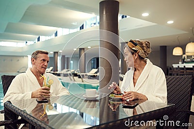 Wealthy Senior Couple Enjoying SPA Resort Stock Photo