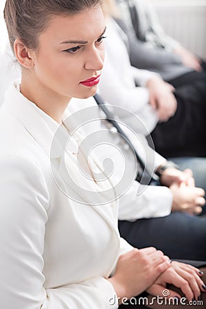 Weary lady waiting for exam Stock Photo