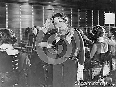 Weary telephone operator Stock Photo