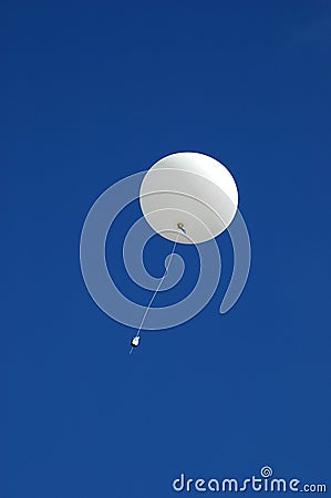 Weather balloon ascending Stock Photo