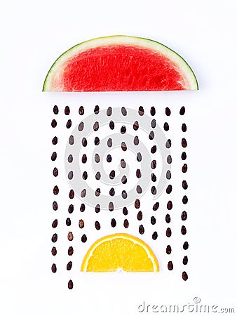 Weather concept, watermelon and orange shape of rainy season. pa Stock Photo