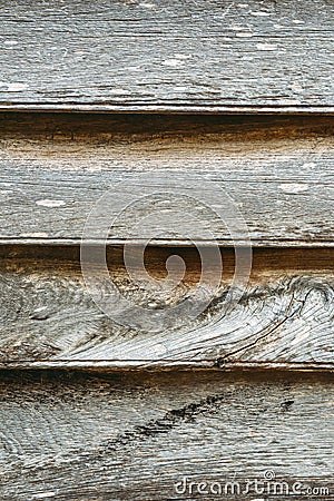 Weathered aged grey wood texture with row of nails and keyholes Stock Photo