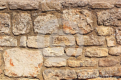 Weathered antique wall, byzantine ancient stonework, horizontal grunge background Stock Photo