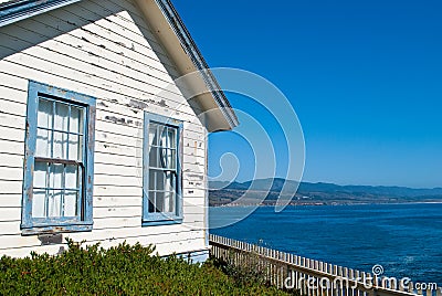 Weathered House by the Sea Stock Photo