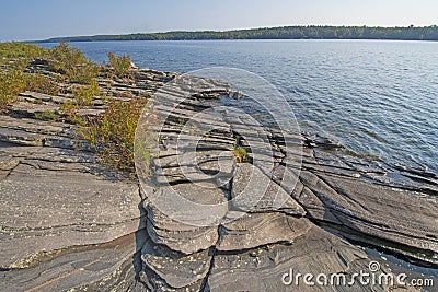 Weathered Rocks and Water on the Great Lakes Shore Stock Photo