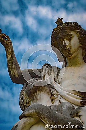 Statue of Angel Taking Soul from Cemetery Stock Photo