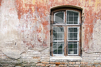 Weathered window and old shabby building wall Stock Photo