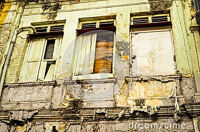 Weathered windows in asian backstreet Stock Photo