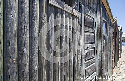 Weathered wooden walls built with logs Stock Photo